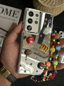 قاب موبایل ( آیفون - سامسونگ ) ام اند ام M&M آیینه ای بنددار - Image 2